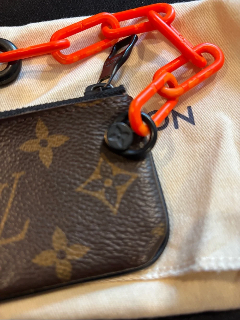 Louis Vuitton Brown Monogram Pouch with Bright Orange Chain